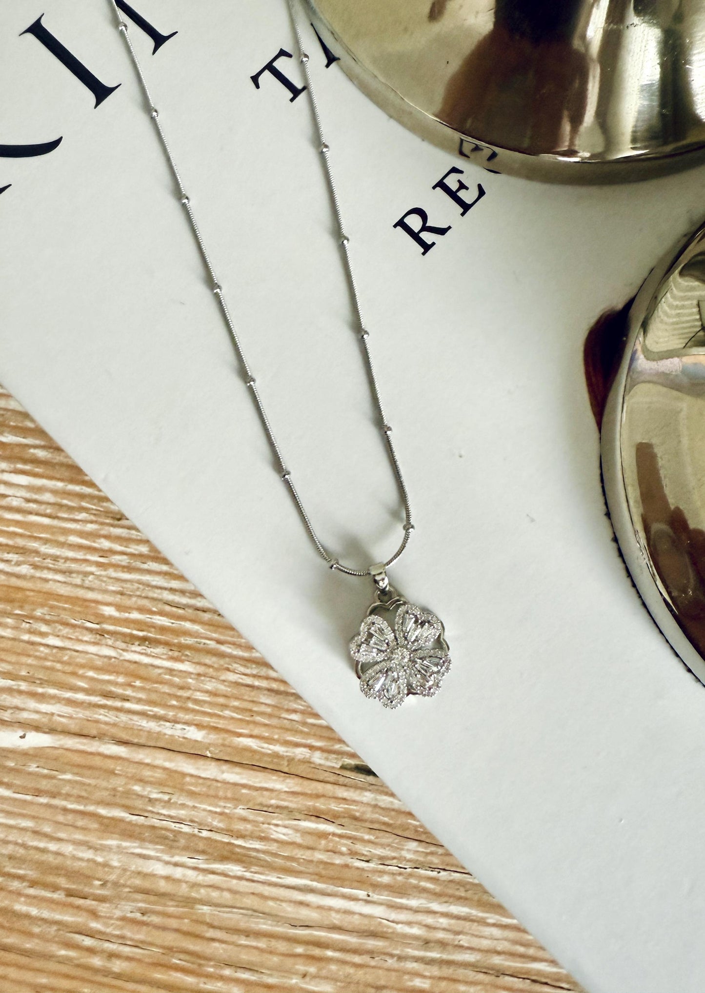 Rotating Four Leaf Clover Necklace: Stainless Steel Lucky Charm
